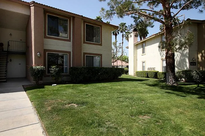 The property is located on the ground of the Two story building. 
It is an end unit with lots of windows and views.
Lots of grass areas to walk your dog :)
