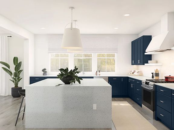 Kitchen with waterfall island and subway tile backsplash