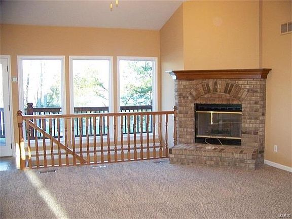 Views from the great room. Rail and spindle staircase goes to full walkout basement.