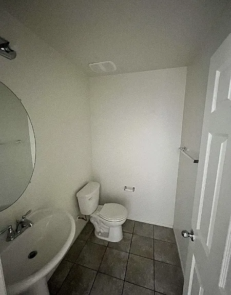 Powder bath for guests off of foyer