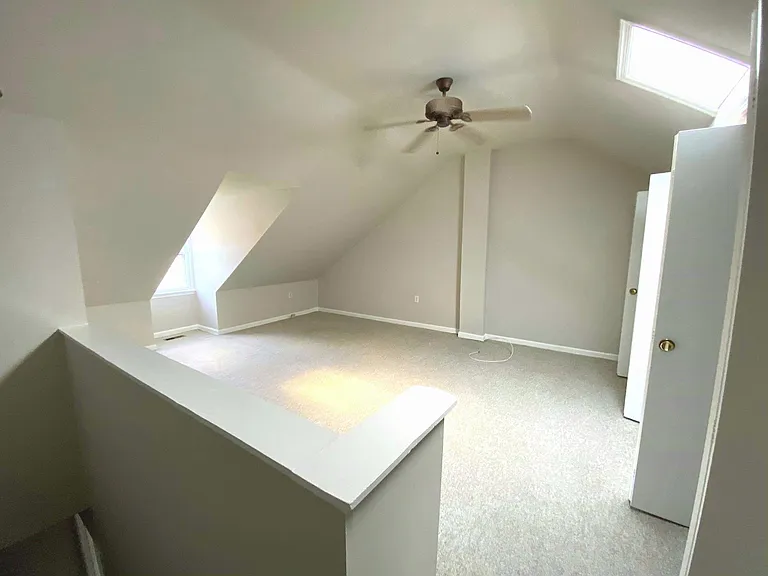 Loft bedroom area on third floor