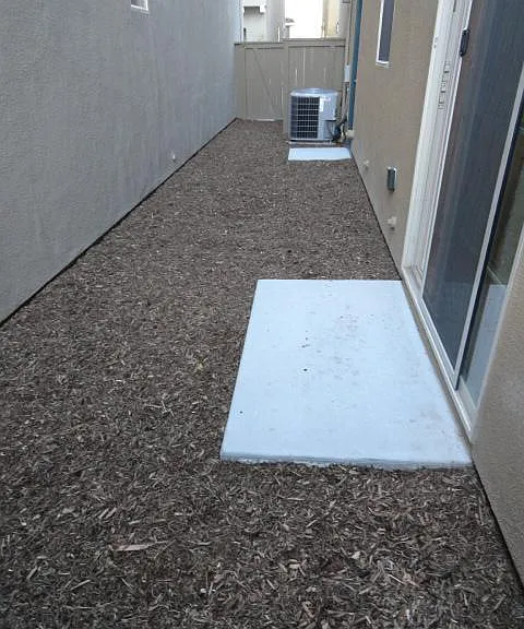 Side yard, each property only has ownership of one side of the yard
