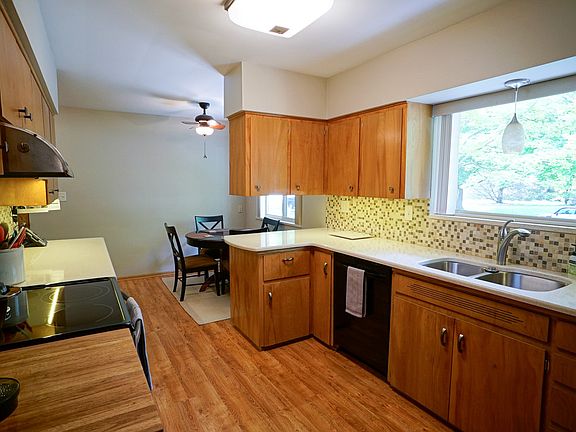 Most of the windows in the home have been replaced and this kitchen was recently updated with Quartz counters and a tile back splash.  