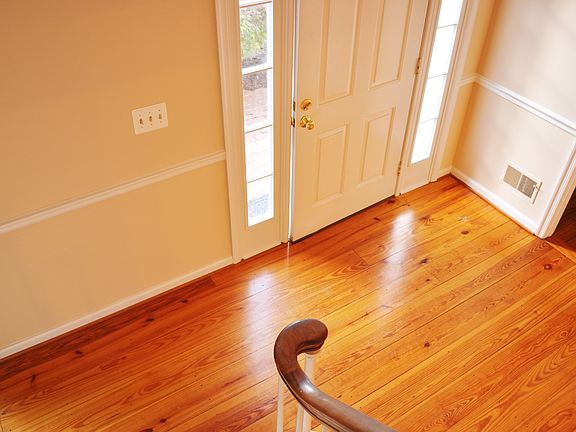 Gleaming hardwood foyer