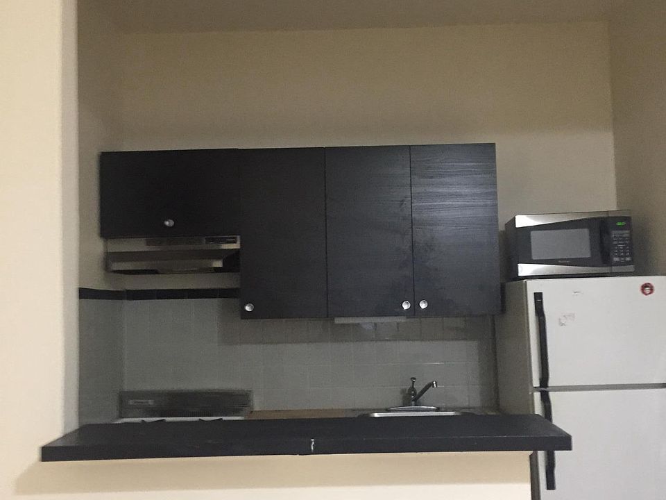 Kitchen with divider wall