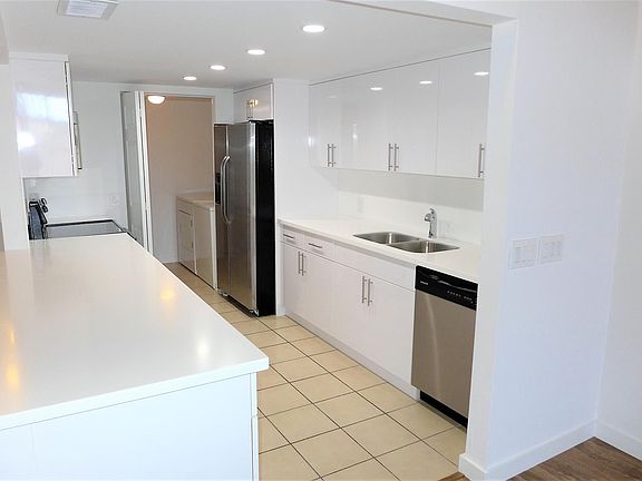 Laundry room & Storage through the kitchen