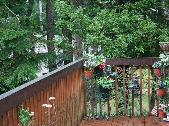 Deck off the livingroom & kitchen makes a lovely setting for entertaining or just relaxing.
