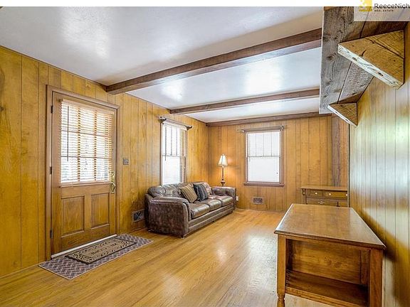 Craftsmanship is visible in every foot of this home, beautiful oak paneling.