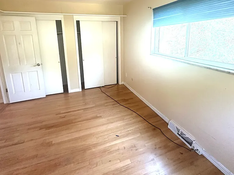 2nd very large bedroom with two closets