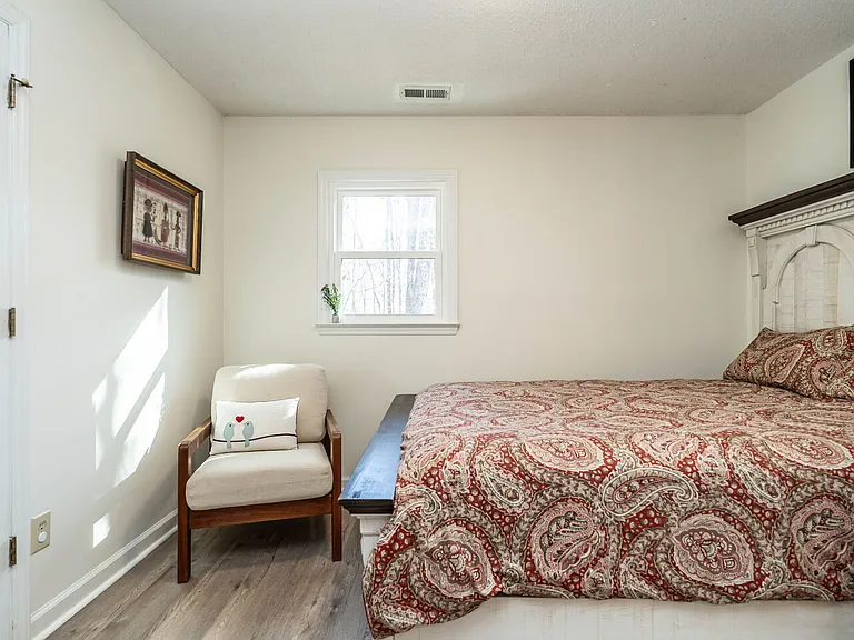 Your own private respite in this tucked away corner in this larger room and a comfy chair too!