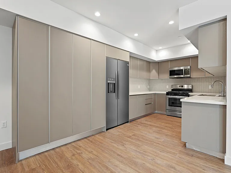 Kitchen with Energy-Efficient Refrigerator, Stove, Microwave Oven, and Dishwasher