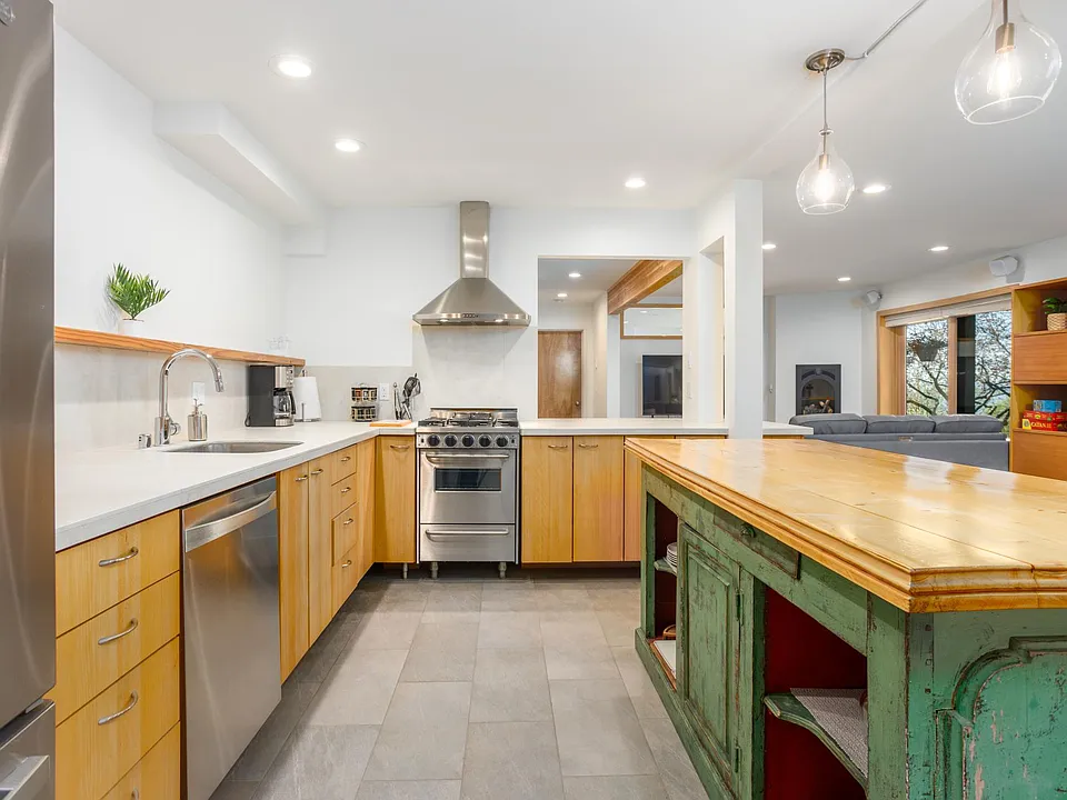 High end appliances in fully stocked kitchen