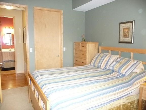 The full bathroom is directly across the hall from the bedroom for easy access.