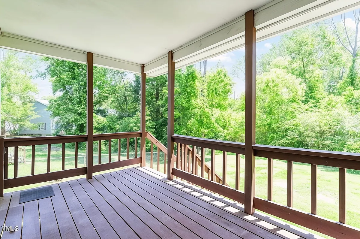Private deck overlooking a spacious fenced yard_perfect for relaxing or entertaining. - 7 Jadewood Ct #A