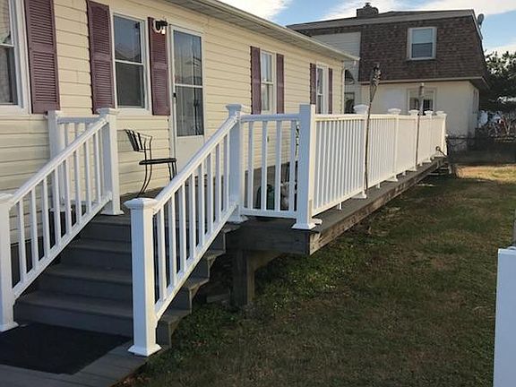 Deck and Entrance facing Bay