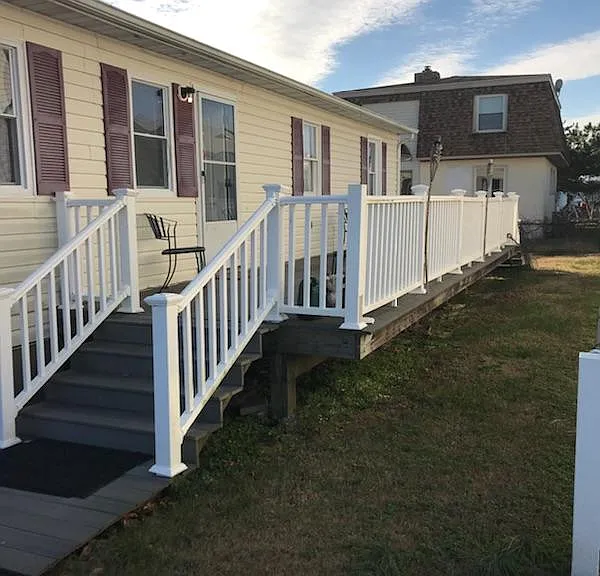 Deck and Entrance facing Bay