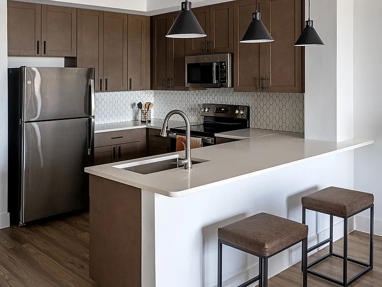 Experience the elegance of this modern kitchen, perfect for culinary creativity and casual dining.