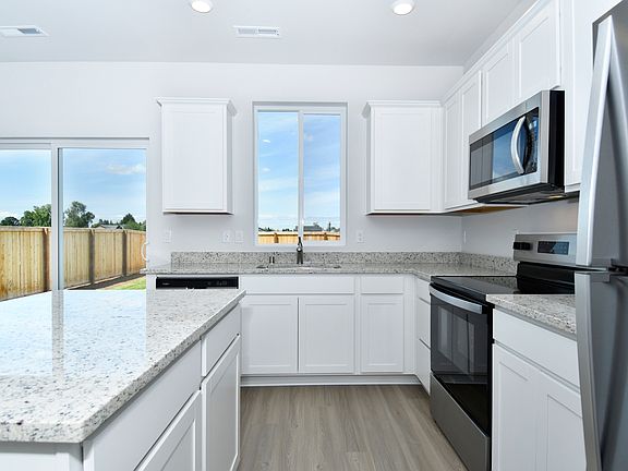 Each kitchen has upgraded, stainless steel appliances included.
