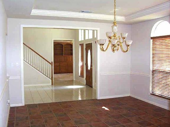 Nicely tiled formal dining!