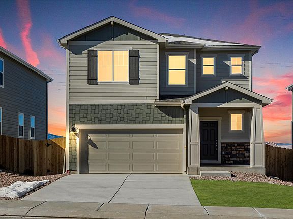 The Red Rock floorplan exterior image taken at a Meritage Homes community in Colorado Springs,