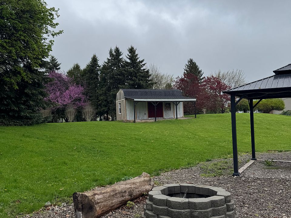 Backyard area and fire pit area.