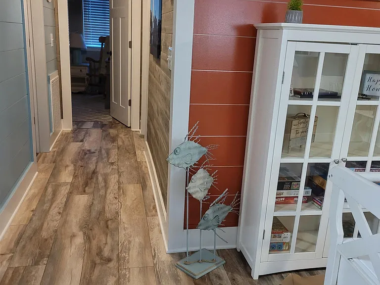 Hallway 2nd bathroom on the left
2nd Bedroom/Murphy bed at the end of the hall. Master on the right