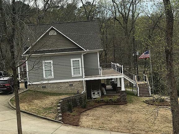 Driveway side of house.