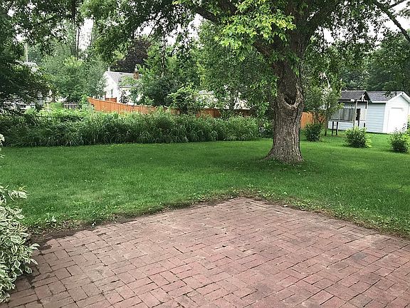 backyard with brick patio