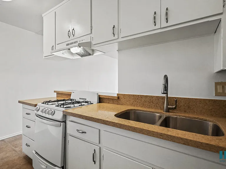 Kitchen with Stove Oven and Ample Cabinet Storage