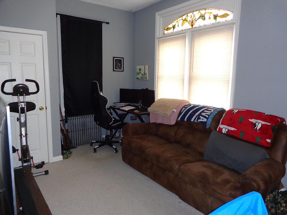 Living room with classic windows/stained glass