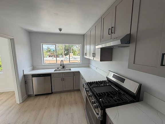 kitchen (facing sink)