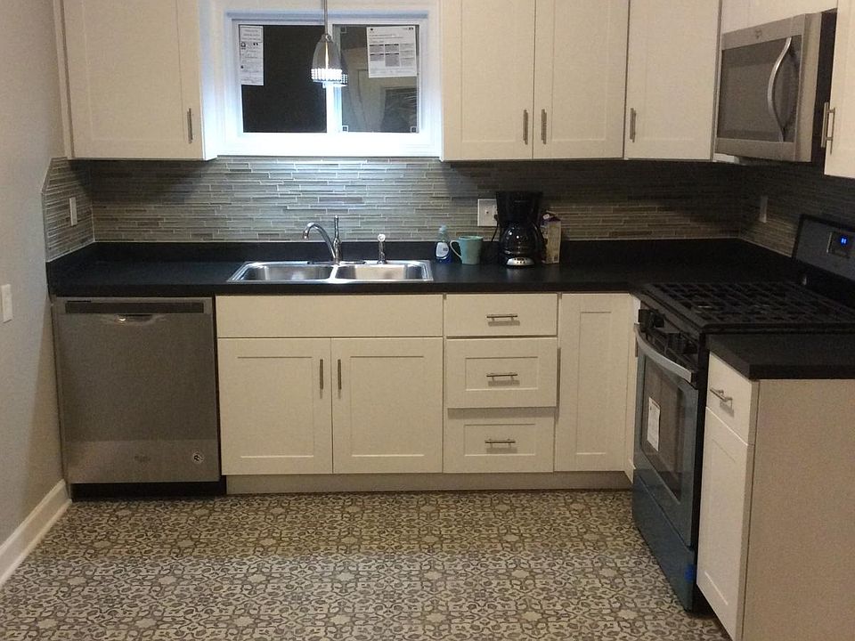 Beautiful kitchen. Appliances include dishwasher, gas stove, microwave. Refrigerator is not provided.