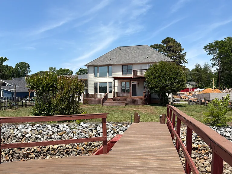 Short walk from the dock back to the private fenced backyard, easy to carry in gear or just unwind after a day on the water.