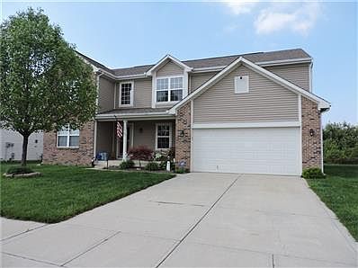 Brick/Vinyl Combo., covered front porch and 2 car garage!