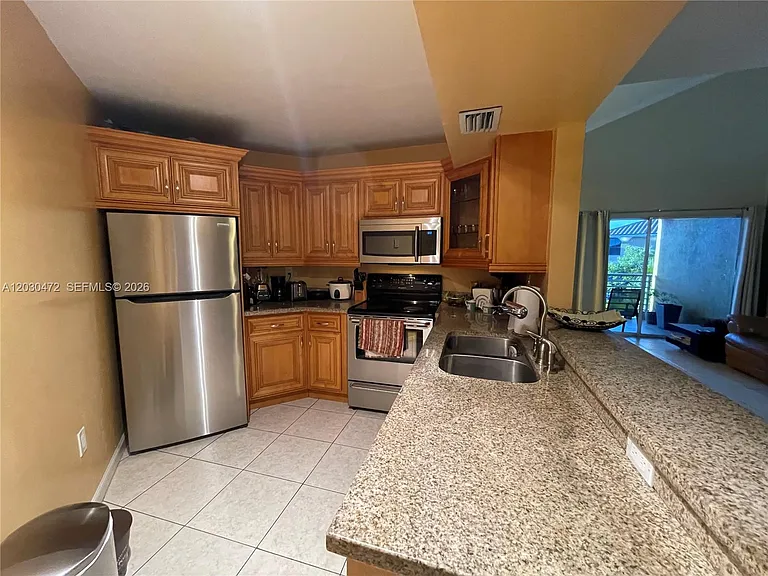 9711 Fontainebleau Blvd #D203 — Photo 8