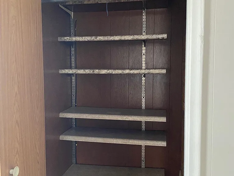 Living room closet, with light