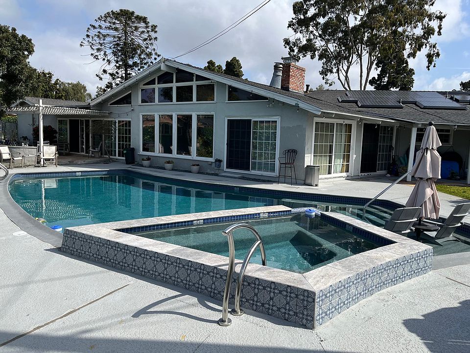 Another view of the pool with a look at the guest room next to pool.