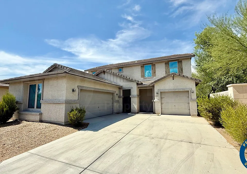 10204 W Lawrence Ln
