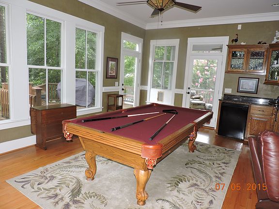 pool room with bar area