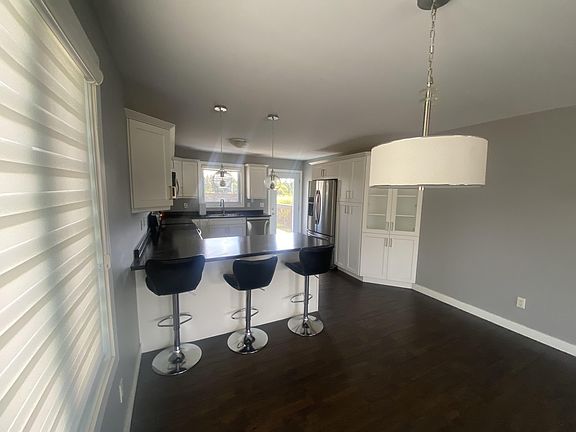 2nd image of 166 Cougar Cres #1