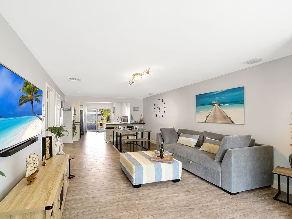 Spacious living room with a queen-size sofa bed, perfect for lounging or accommodating extra guests.