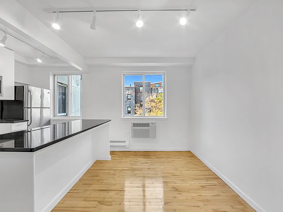 4th image of 319 E 8th St APT 6C