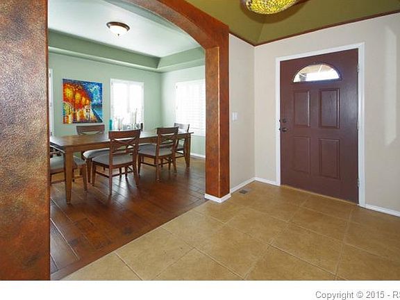 Inside the front door, you will find the formal dining room with its coved ceili