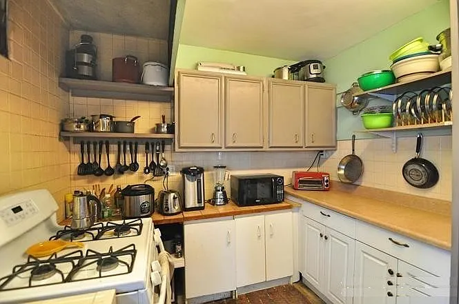 this is the old kitchen. currently being fully renovated with new cabinets, etc.