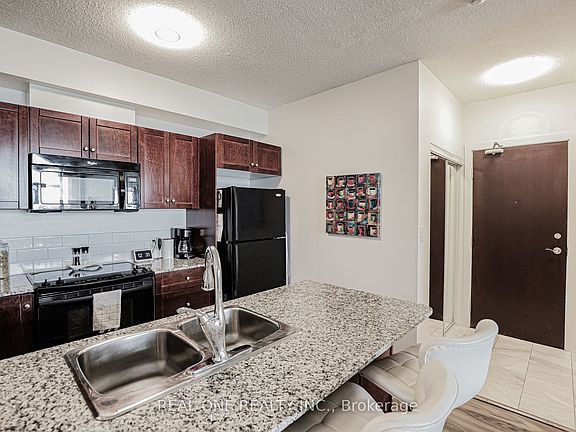 2nd image of 1359 Rathburn Rd E #1714