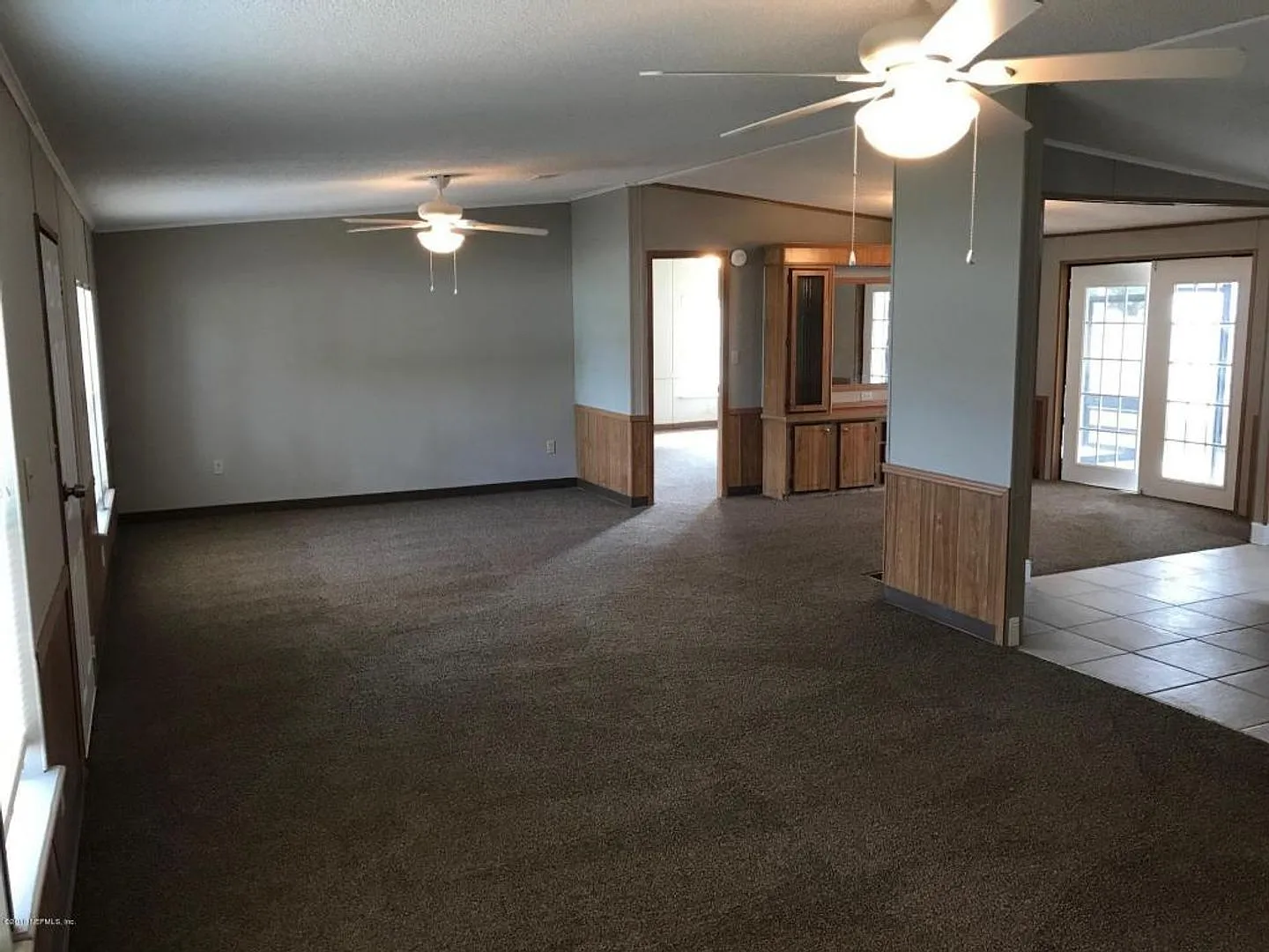 Remodeled 3 bed 2 bath 1,628 sq ft home with a large screen — Photo 3