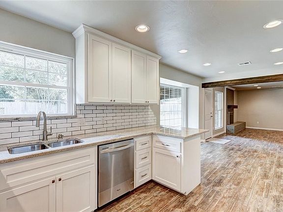 Plenty of storage in this kitchen, even under the breakfast bar!