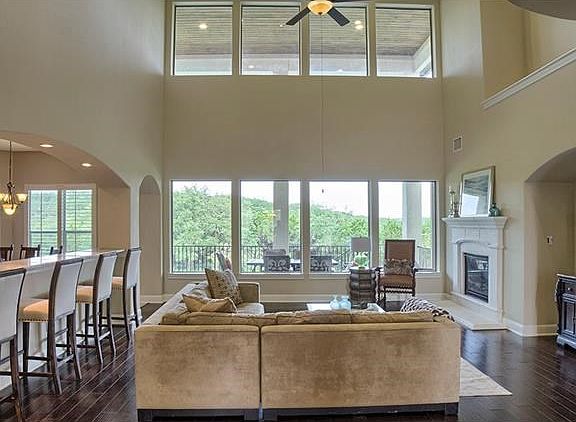 Plenty of space for entertaining in the open gourmet kitchen and living room area of this fabulous custom home.