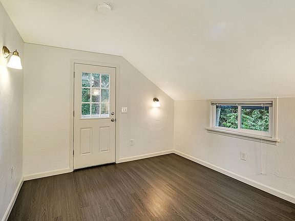 Master bedroom with door overlooking Pipers Creek