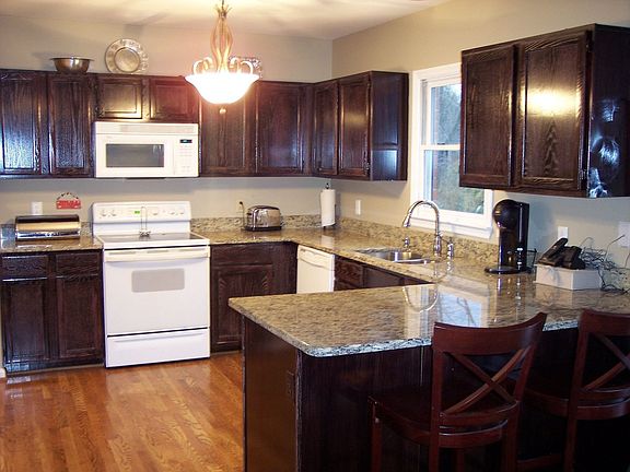 Granite Countertops! Professional Decorative Paint Treatment on Cabinets!